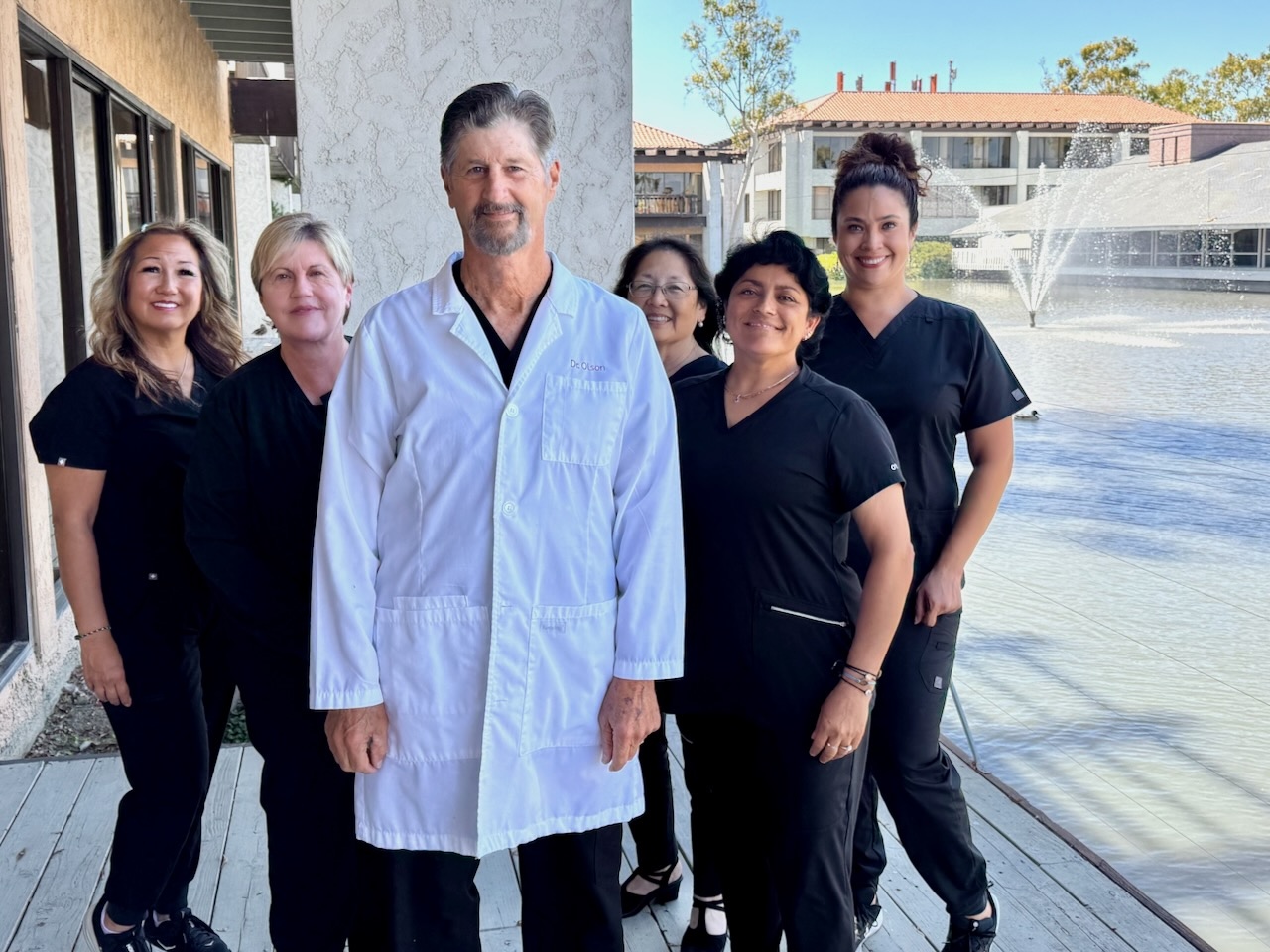 Dr. John Olson and his dental team at their Huntington Beach office